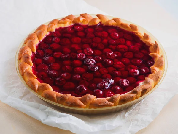 Berry sweet round pie on a table napkin — Stock Photo, Image