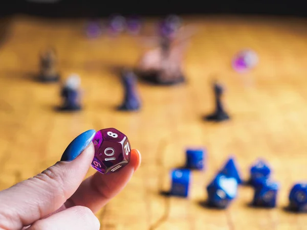 Roleplay game with dragons in dungeon. Yellow field dice — Stock Photo, Image