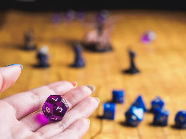 Roleplay game with dragons in dungeon. Yellow field dice — Stock Photo, Image