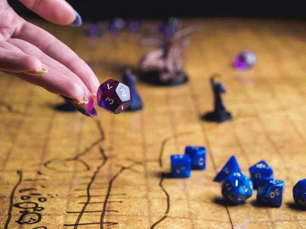 Roleplay game with dragons in dungeon. Yellow field dice — Stock Photo, Image