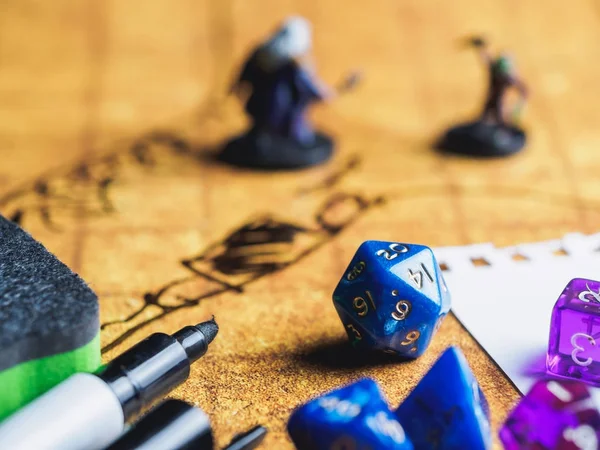 Roleplay game with dragons in dungeon. Yellow field dice — Stock Photo, Image