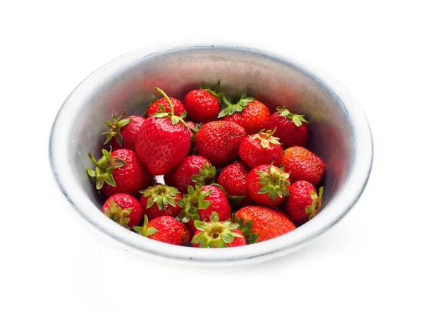 Strawberries in a tin bowl in the center of the table — Stock Photo, Image