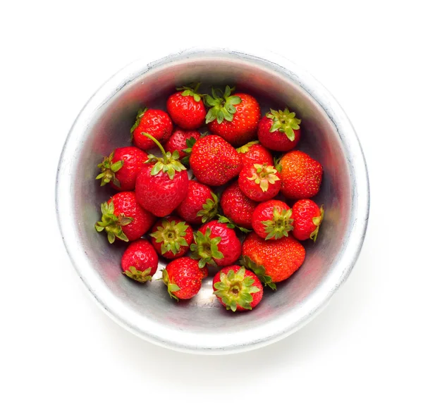 Strawberries in a tin bowl in the center of the table — Stock Photo, Image