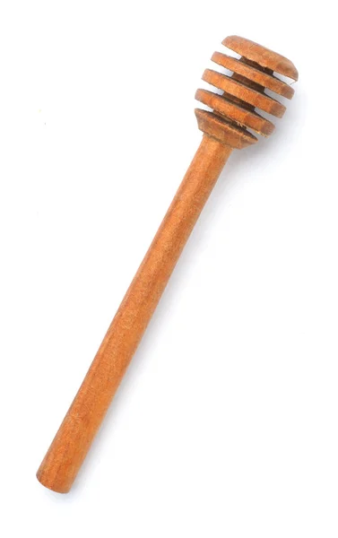 Light wooden honey wand on the white isolated background — Stock Photo, Image