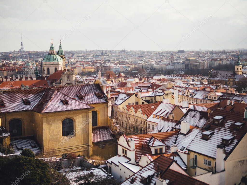 Red roofs of old medieval town in Prague. Winter