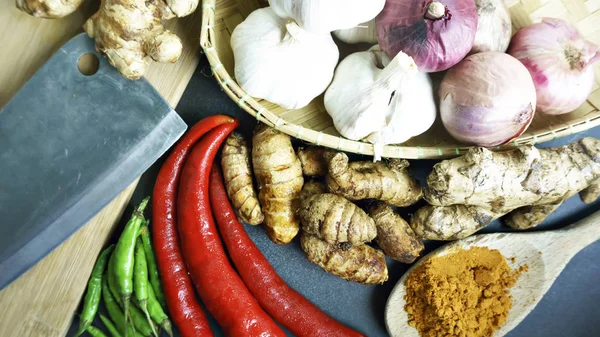 Asian cuisine ingredients of herbs, spices, turmeric, red pepper — Stock Photo, Image