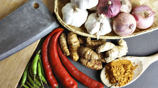 Asian cuisine ingredients of herbs, spices, turmeric, red pepper — Stock Photo, Image