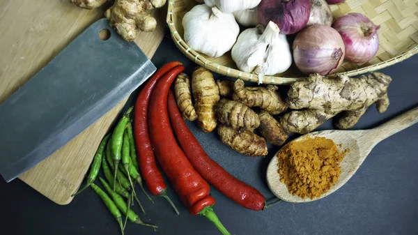 Asian cuisine ingredients of herbs, spices, turmeric, red pepper — Stock Photo, Image