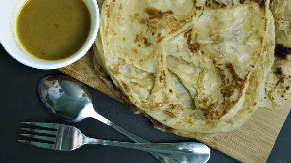 Roti Canai and dhal curry — Stock Photo, Image