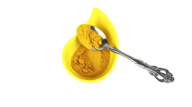 köri ve baharat izole bir kaşık ile bir kap içinde