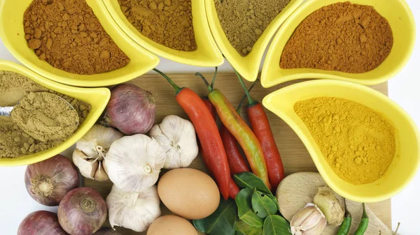 Grind spices in ceramic containers on white background — Stock Photo, Image