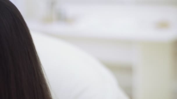 Close up portrait of young beautiful woman with brown hair — Stock Video