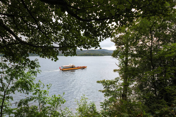 Wooden boat on Derwentwater Lake in the Lake District, England, UK