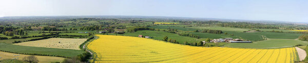 Panoramic view from Cley Hill to the fields and farms, Wiltshire, England.