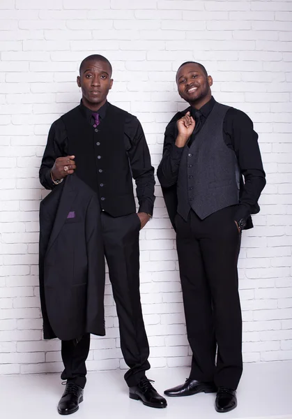 Two african man businessmen in black suit — Stock fotografie