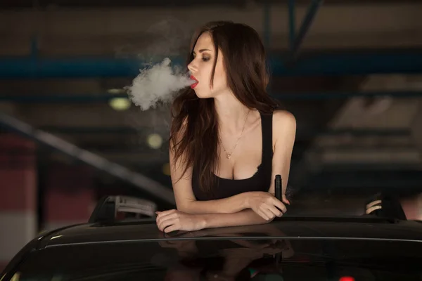 Sexy woman smoking — Stock Photo, Image