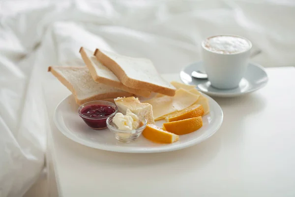 Breakfast in bed in hotel room. Accommodation.