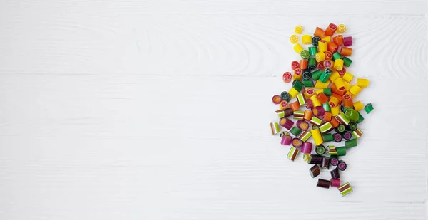 Coloridas Piruletas Bastones Caramelo Dulces Caramelos Mezclan Sobre Fondo Madera —  Fotos de Stock