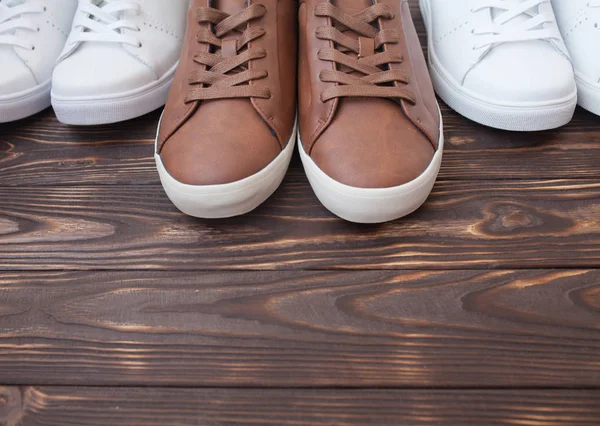 Arious Pairs Colorful Sneakers Laid Wooden Floor Background — Stock Photo, Image