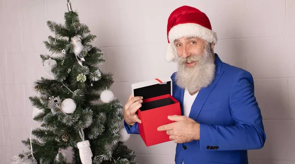 Handsome Senior Bearded Man Holding Gift Box White Background Looking — Stock Photo, Image