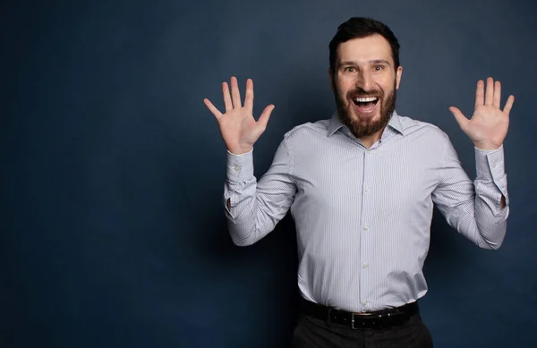 Happy Bearded Businessman Looking Camera Blue Background Copy Space — Stockfoto