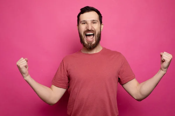 Young Bearded Man Celebrating Victory Pink Background — Stockfoto