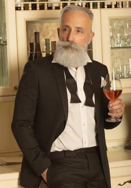 Elegant Bearded Senior Gentleman Proposing Toast Glass Rose Wine Looking — 스톡 사진