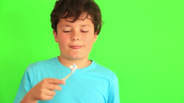 Young boy brushing his teeth — Stock Video