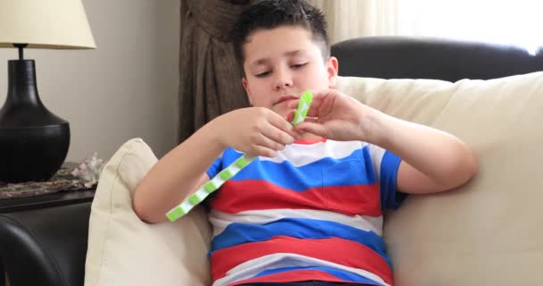 Preteen Boy Playing His Toy — Stock Video