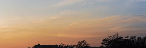 Background of sky and trees at sunset time, twilight