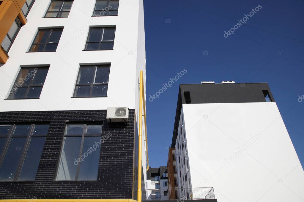 Construction of a residential multi-storey building. New residential area. Building - stock image.