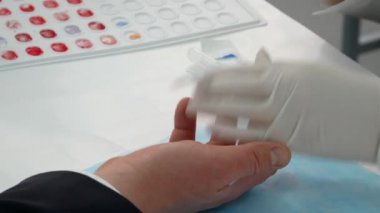 VINNYTSIA, UKRAINE - JANUARY 28, 2020: Video set: Blood Donation Center. Determination of blood type. Blood sampling from a finger for analysis - Editorial Footage