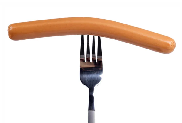 Tasty frankfurter sausage on a fork isolated — Stock Photo, Image