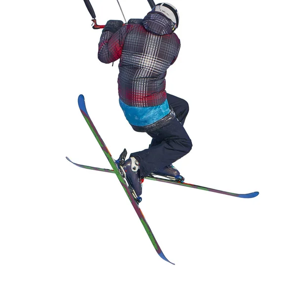 A sportsman practicing snow kiting jumping, isolated on white background. Close-up.