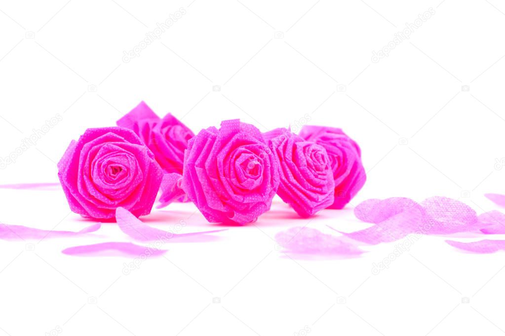 Pink rose fabric flower and small hart on white background for V