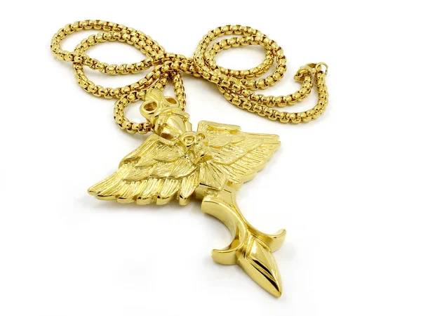 Золотое ожерелье - Крылья и череп - Нержавеющая сталь — стоковое фото