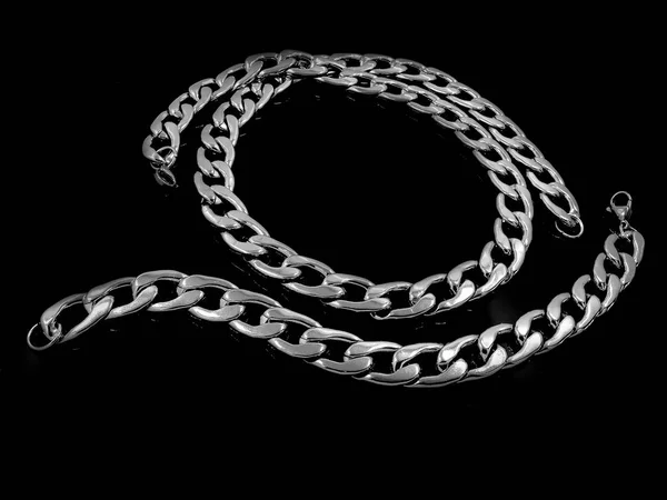 Комплект ожерелья и браслета - Серебряная нержавеющая сталь — стоковое фото
