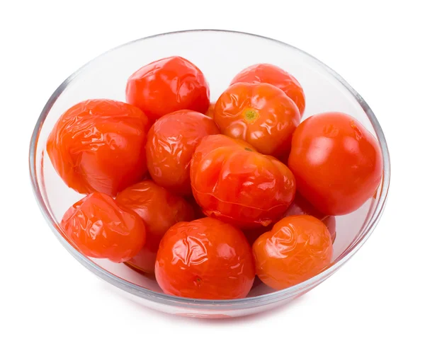 Tomatoes marinated in a plate Royalty Free Stock Images