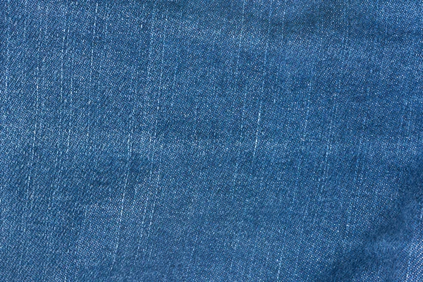 Текстура фона синих джинсов — стоковое фото