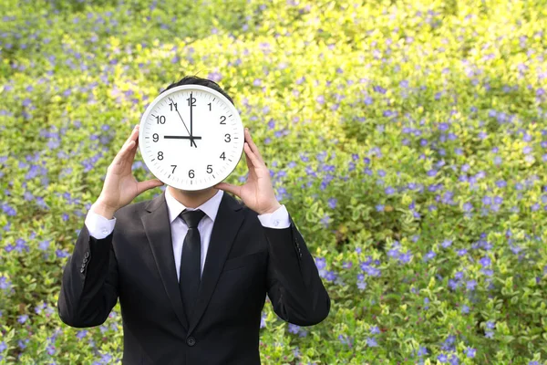 businessman with clock in hands