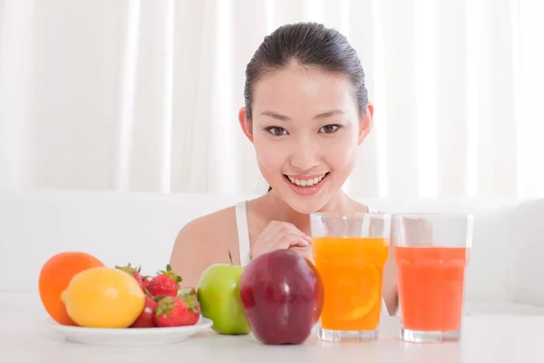 young asian woman with healthy food and juice