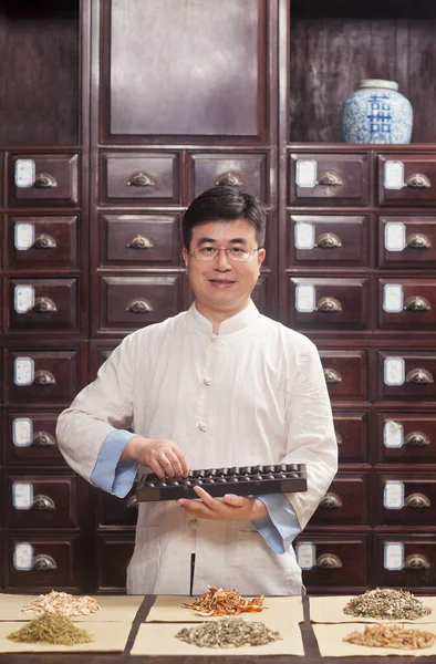 asian man in traditional chinese kitchen