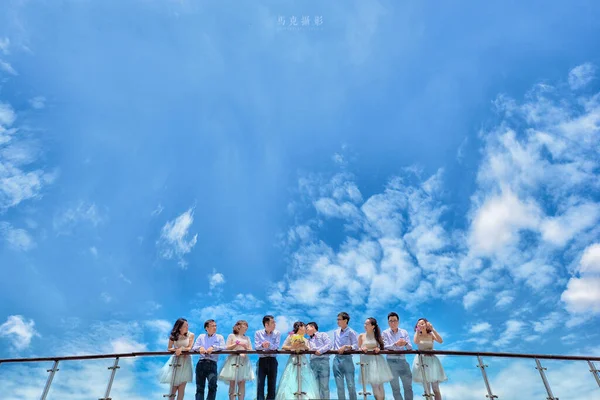 group of people in the sky