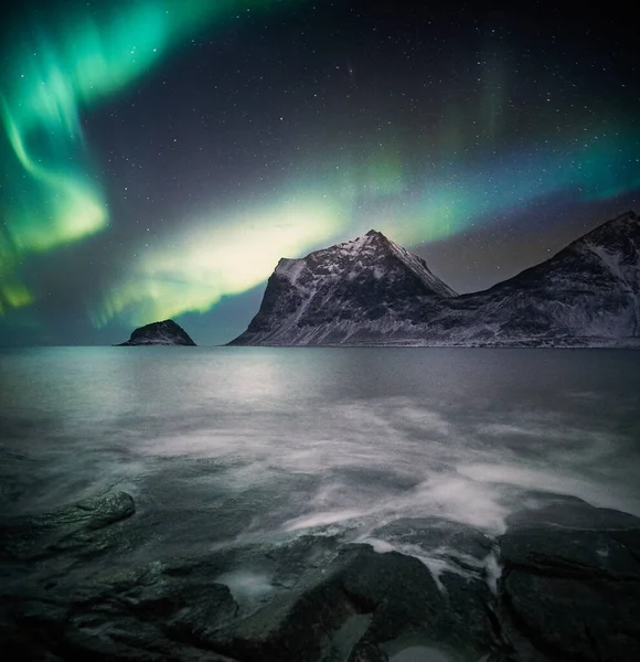 northern lights over the sea in the night