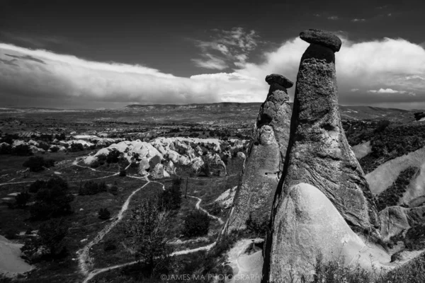 black and white photo of a rock formations in the utah valley