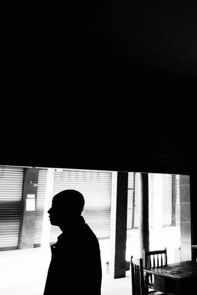 black and white photo of a man in a suit