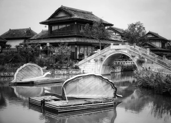 the old bridge in the city of the river in the morning