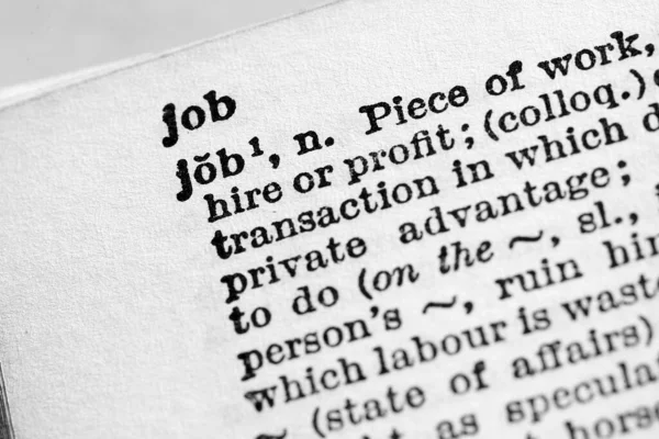 Job - Closeup macro of English dictionary page with word job