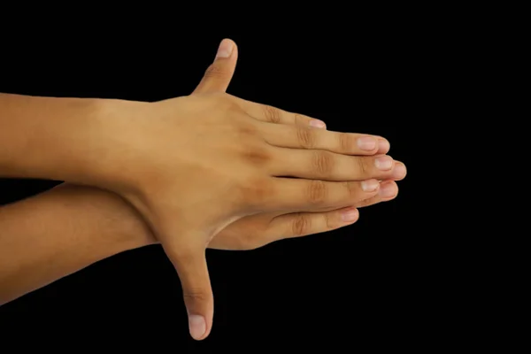 female hands on black background.