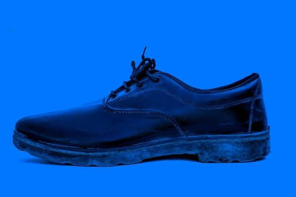 Close Shot Black Colored School Shoe Isolated Blue Colored Background — Stock Photo, Image